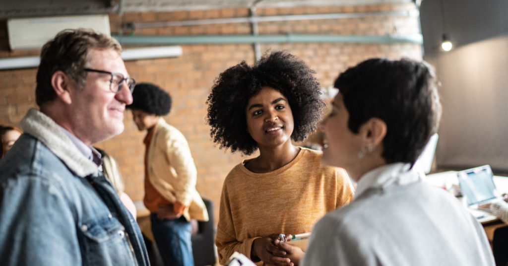 people talking at the office human connections